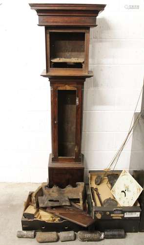 A collection of longcase clock parts, to include; an oak cas...