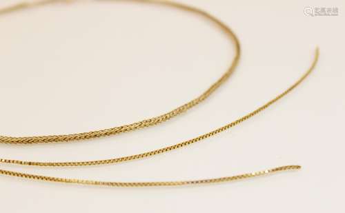 A yellow metal herringbone chain, with spring ring and loop ...