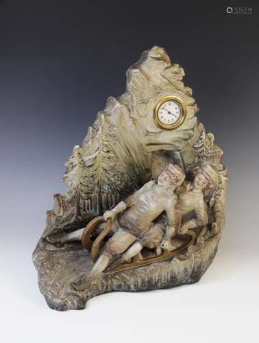 A large Czechoslovakian terracotta novelty figural clock, mi...