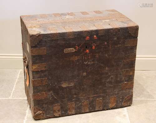 A 19th century stained pine and metal bound trunk, label ver...