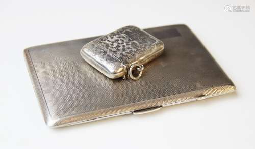 A George V silver cigarette case by E.J. Houlston, Birmingha...