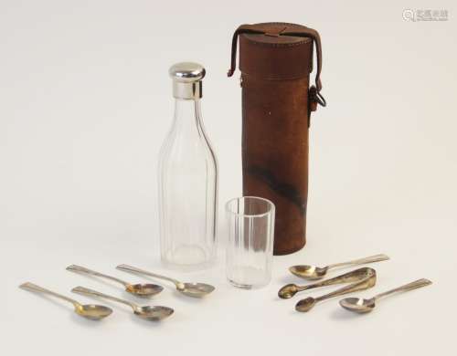 A cut glass white metal mounted hunting flask, of faceted cy...