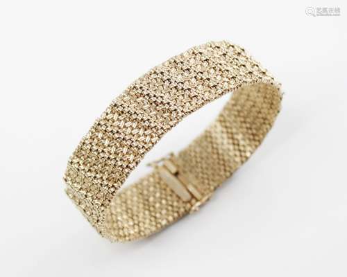 A 9ct integral-link bracelet, the textured woven-link strap ...