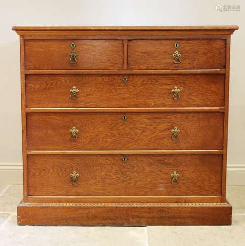 A late 19th century oak Aesthetic movement chest of drawers,...