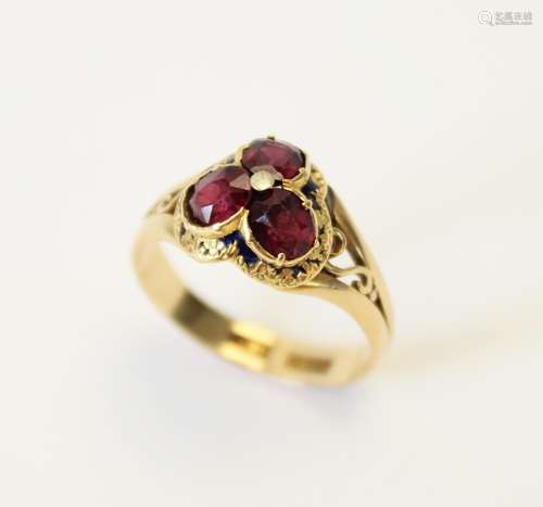 A Victorian garnet and enamel 18ct gold ring, the trefoil sh...