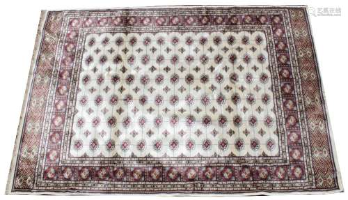 An ivory ground full pile Kashmir carpet, with an all over B...