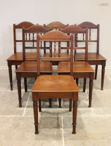 A set of six late 19th century walnut country dining chairs,...