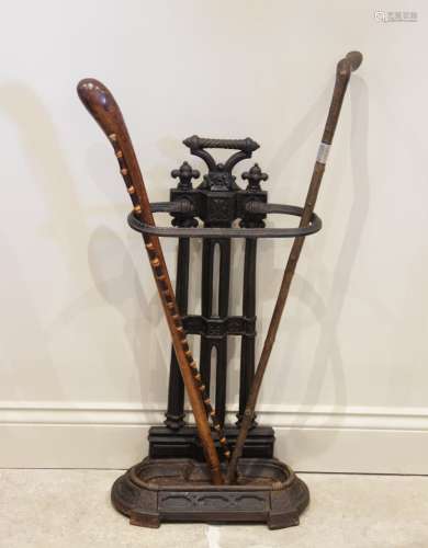 A Victorian cast iron stick stand, of architectural form, th...