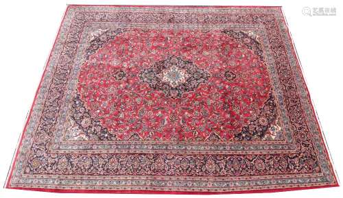 A very large red ground Persian Kashmir carpet, with traditi...