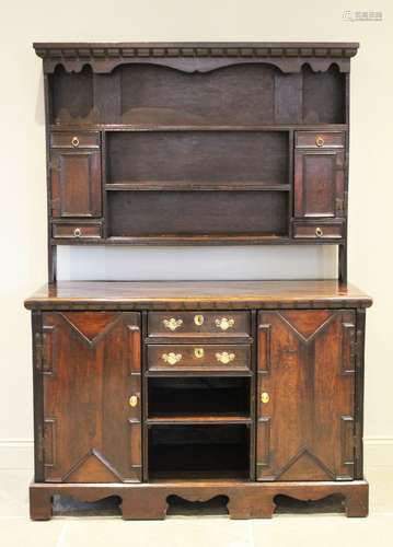 An 18th century and later assembled oak dresser and associat...