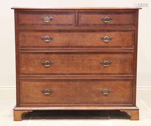 A George III oak and mahogany cross banded chest of drawers,...