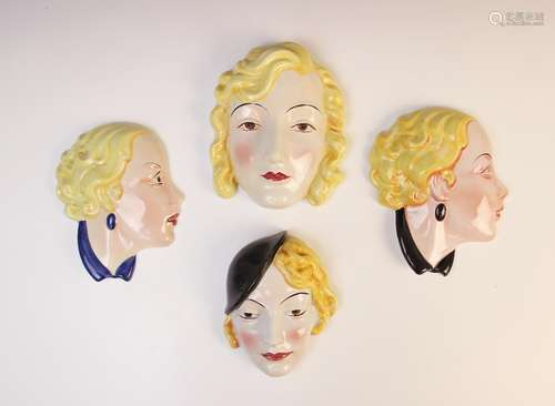 Four Art Deco wall masks by Cope & Co, two modelled as a you...