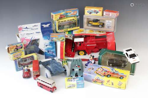 A collection of boxed and un-boxed diecast model vehicles by...