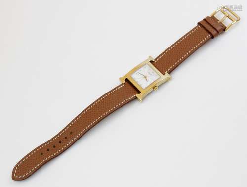 A lady's Hermes Heure H gold plated stainless steel wristwat...