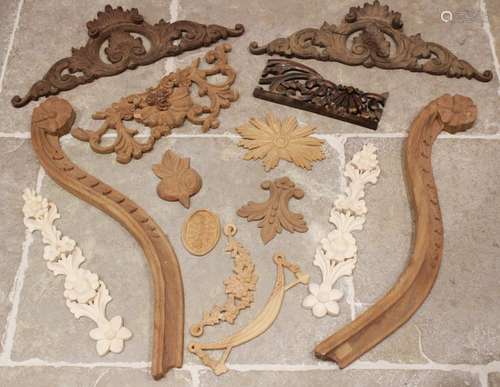 A quantity of carved architectural panels, mouldings and tri...