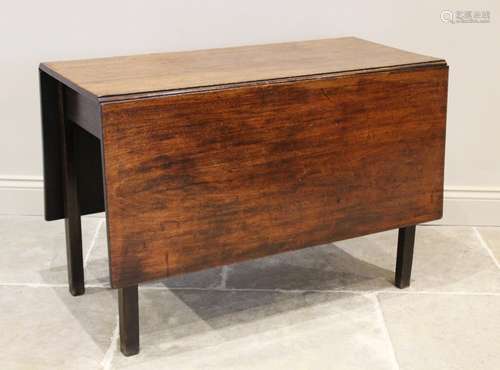 A George III mahogany drop leaf dining table, the rectangula...