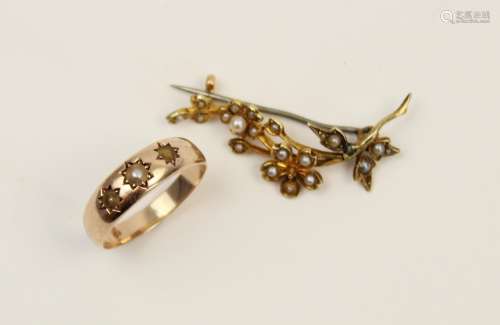 An early 20th century yellow metal cultured pearl set floral...
