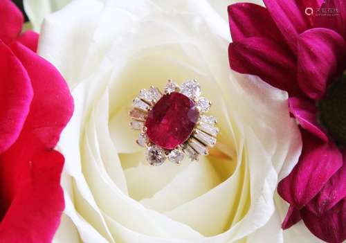 A ruby and diamond cluster ring, the central rectangular cus...