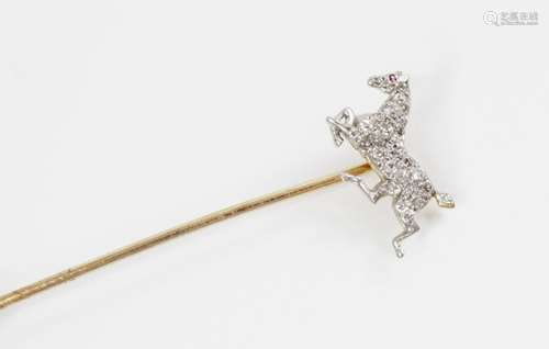 An early 20th century diamond and ruby horse stick pin, the ...