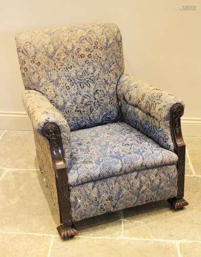 A 19th century upholstered mahogany armchair, in the manner ...