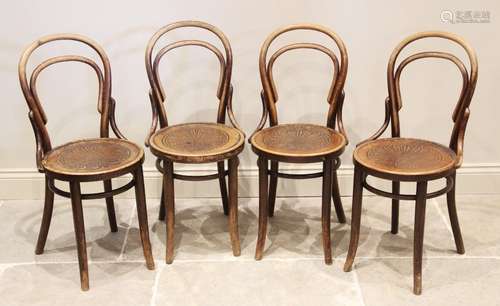 A set of four early 20th century stained beech wood 'Thonet'...