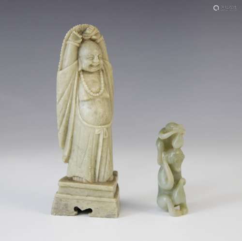 A Chinese jade carving, 20th century, depicting two monkeys ...