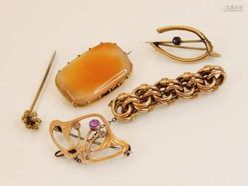 A yellow metal amethyst set Art Nouveau brooch, in the manne...