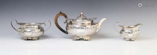 A George III silver three piece tea service by Joseph Angell...