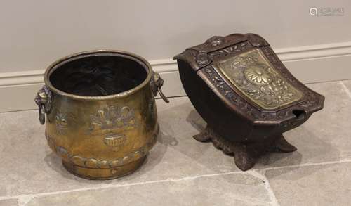 A late 19th century French iron coal scuttle, of typical boa...