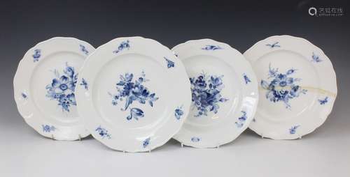 Four Meissen blue and white plates, 19th century, each decor...