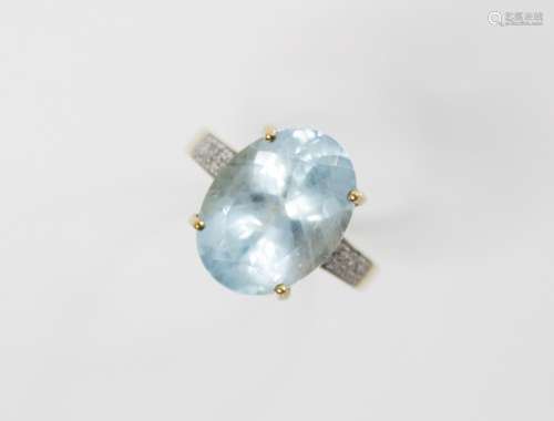 An aquamarine and diamond 9ct gold ring, the central oval mi...