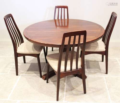 A mid century rosewood pedestal dining table, probably India...