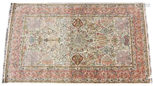 A Persian pattern silk work rug, the stylised mirrored garde...