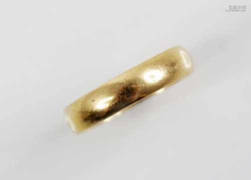 A 22ct gold wedding band, marks for Birmingham 1930, ring si...