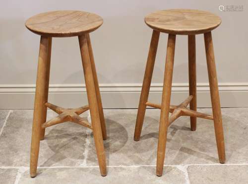 A pair of Robin Nance elm bar stools, each with a gently dis...