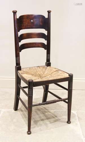 A late 19th/early 20th century Arts and Crafts stained beech...