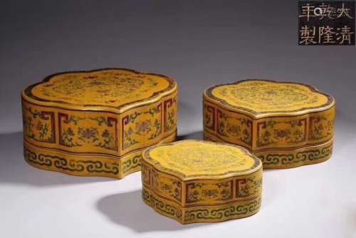 a group of three chinese yellow-ground boxes