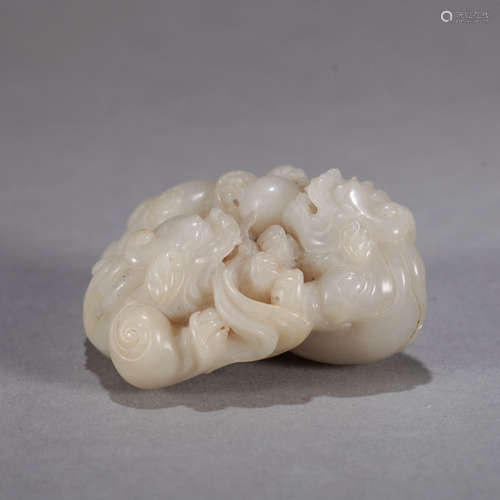 A CHINESE CARVED LION JADE