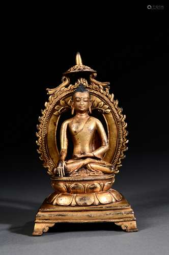 A INDIAN PALA PERIOD GILT BRONZE FIGURE OF BUDDHA