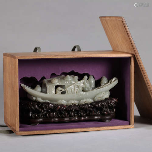 A Chinese Carved Jade Decoration with Wood Stand