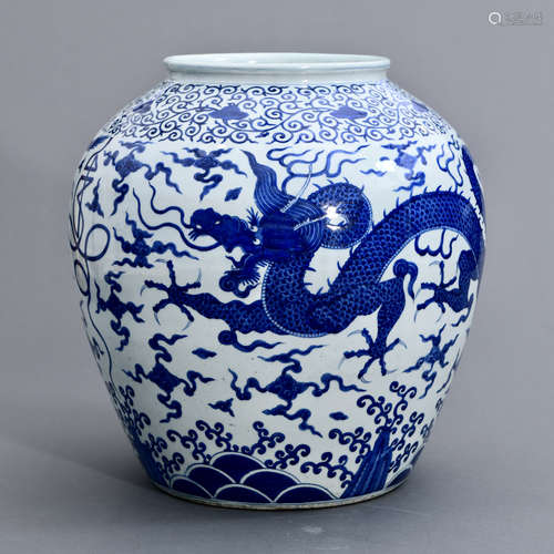 A CHINESE BLUE AND WHITE PORCELAIN JAR WITH DRAGON PATTERNS,...