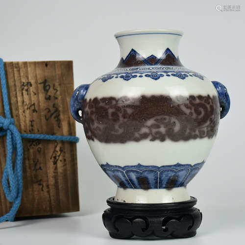 AN UNDERGLAZED-BLUE AND COPPER-RED FLORAL CHI-DRAGON-EARED V...