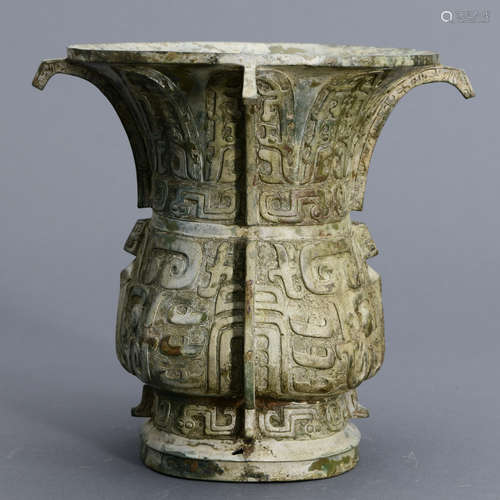 A CHINESE BRONZE RITUAL VESSEL, ZUN,SHANG DYNASTY STYLE