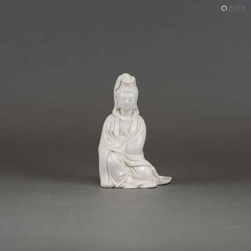 A WHITE-GLAZED STATUE OF GUANYIN