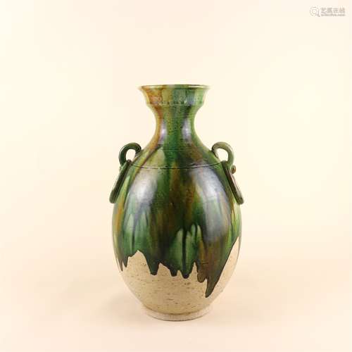 A CHINESE THREE-COLOUR GLAZED POTTERY VASE