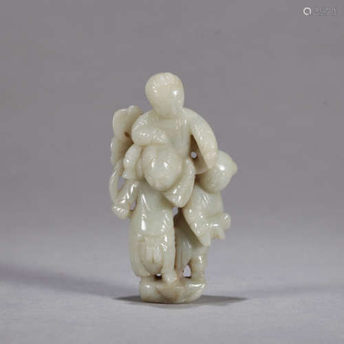 A CHINESE CARVED FIGURE JADE