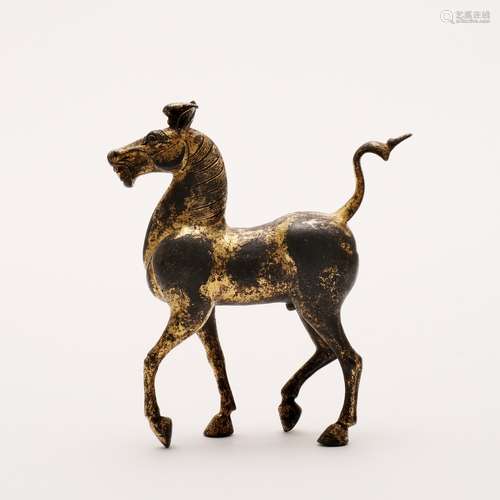 A CHINESE GILT BRONZE HORSE,HAN DYNASTY STYLE