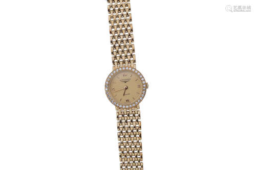 LADY'S LONGINES DIAMOND SET NINE CARAT GOLD QUARTZ WRIST WAT...