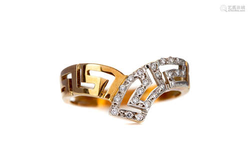 A GEM SET GREEK KEY DESIGN RING