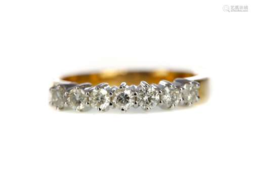 A CERTIFICATED DIAMOND SEVEN STONE RING